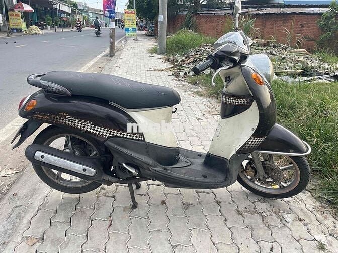 Mio cho ae cày bừa