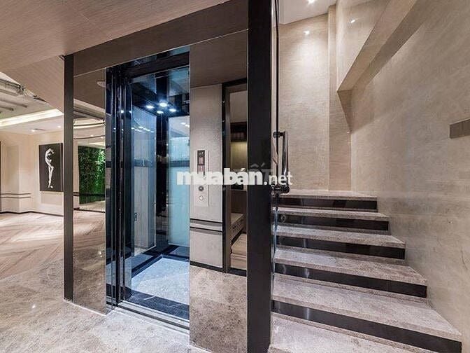 Cho thuê nhà, pccc, Thang máy, Vỉa hè, 106m2_ 5T, Phố Duy Tân-51 Tr