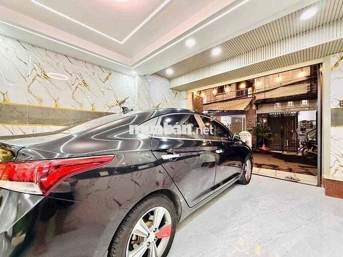 XE HƠI NGỦ TRONG NHÀ QUẬN 7, 3 TẦNG, NGANG HIẾM 5M, NGUYỄN THỊ THẬP