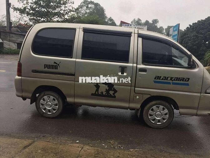 Daihatsu 2004 7 chỗ Vàng cát