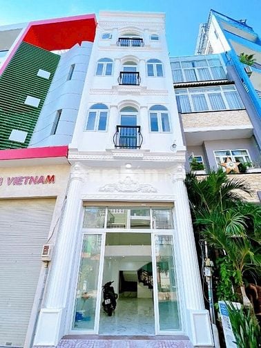 NHÀ 3,5LẦU MT ĐƯỜNG TRẦN HƯNG ĐẠO , PTT , QUẬN TÂN PHÚ