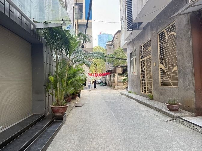 NHÀ PHÂN LÔ HUỲNH THÚC KHÁNG - NGUYÊN HỒNG - 55M X 8 TẦNG - GARA Ô TÔ 