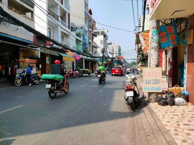 Cần bán nhà MT Lạc Long Quân, Q.11, kế chợ Bình Thới, 4 tầng, mới-đẹp