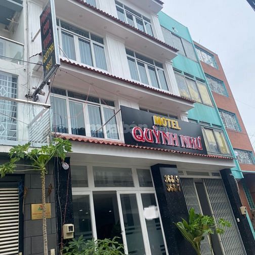 Bán khách sạn đường 8m Kinh Dương VươngDT: 8x14m,3 lầu có 13 phòng lớn
