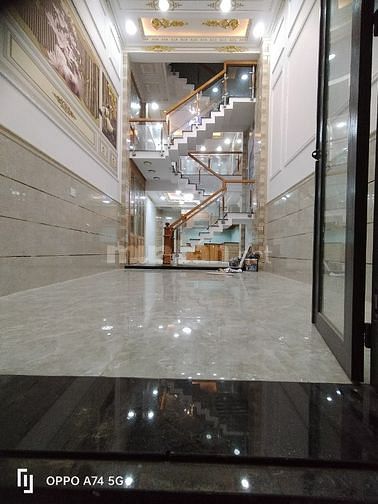 Nhà 1 trệt 1 lửng 2 lầu DTSD200M2 85 đường Bình Thành Quận Bình Tân