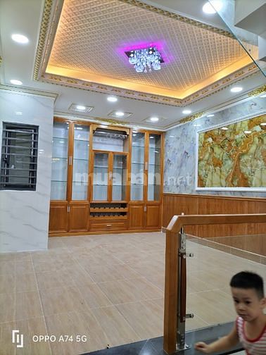 Nhà 1 trệt 1 lửng 2 lầu DTSD200M2 85 đường Bình Thành Quận Bình Tân