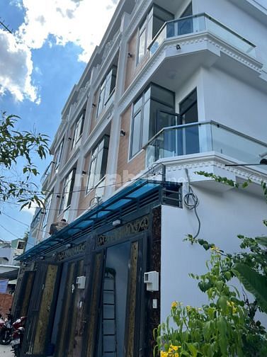 Bán nhà phố sát Mt Quang Trung 3.3m x 13m,1 trệt 3 lầu đường thông 4m.