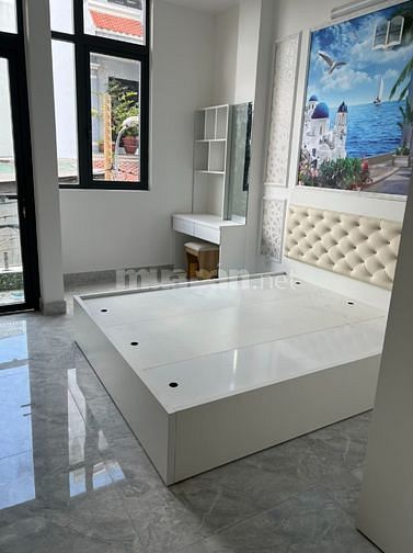 Bán nhà phố sát Mt Quang Trung 3.3m x 13m,1 trệt 3 lầu đường thông 4m.