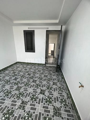 Bán nhà phố sát Mt Quang Trung 3.3m x 13m,1 trệt 3 lầu đường thông 4m.
