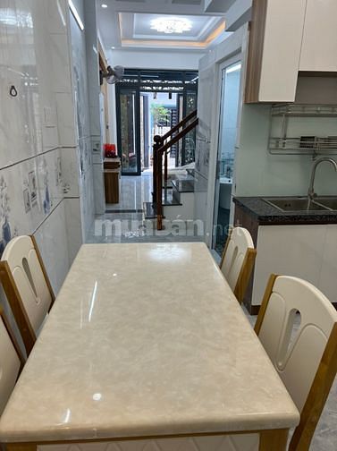 Bán nhà phố sát Mt Quang Trung 3.3m x 13m,1 trệt 3 lầu đường thông 4m.