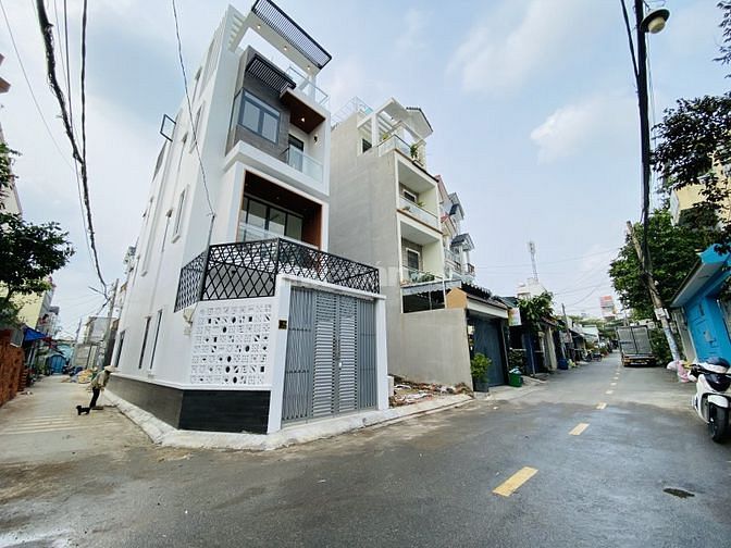 Nhà mới lô góc MT đường số, Lã Xuân Oai, Q9, 72m2, đường 7m, 4 tầng. 