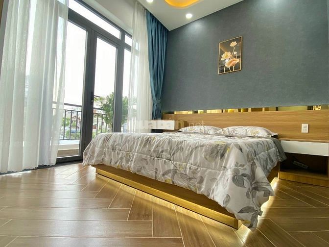 Nhà 2 lầu 4PN đường 7m ngay chợ Liên Khu 5-6 giá 2ti8