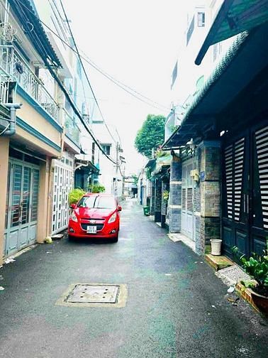 Bán nhà nát rẻ sau căn mặt tiền (4,1x16) 1146/ Quang Trung P8 Gò V