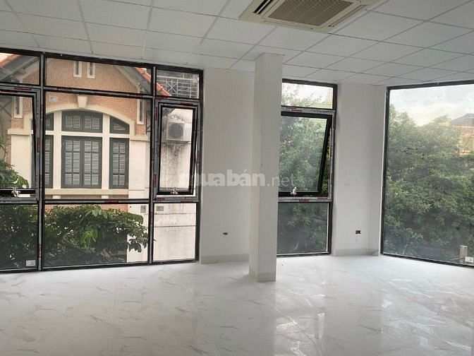 Tòa văn phòng Phố Kim Mã 4 tầng,thang máy,420m2, 2 mặt tiền, KD tốt