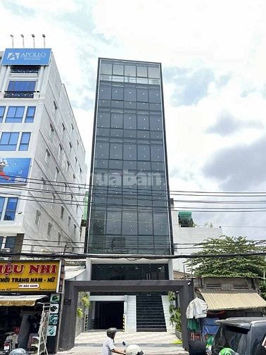 Tòa nhà MT 122-122A Nguyễn Xí, Bình Thạnh. DT 7.7x20m, hầm 8 tầng