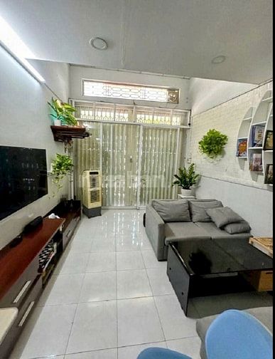 Bán nhà Hậu Giang ngay Him lam 70m2 hẻm xe hơi thông 4 tầng đúc 6 PN.