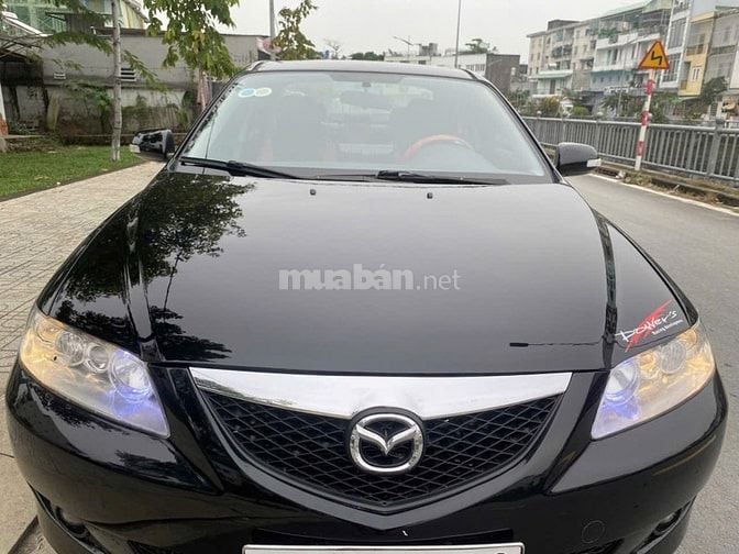 Cần bán mazda 6 AT màu đen. sx 2005