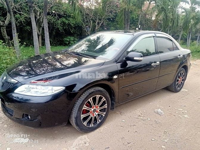 Cần bán mazda 6 AT màu đen. sx 2005