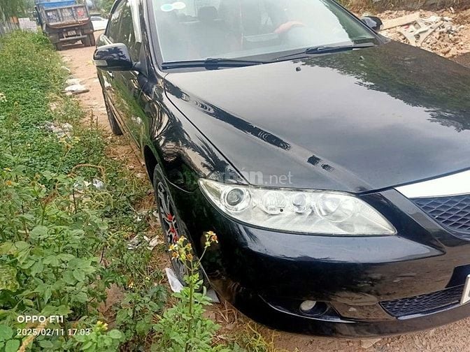 Cần bán mazda 6 AT màu đen. sx 2005