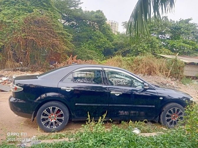 Cần bán mazda 6 AT màu đen. sx 2005