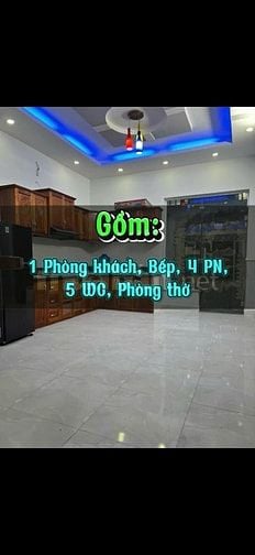 Nhà đẹp, xe tải đậu trước nhà.