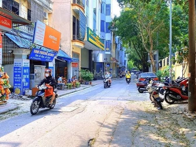 CẦN BÁN GẤP , TÒA NHÀ 7 TẦNG VÀ 1 HẦM - PHÙNG CHÍ KIÊN - CẦU GIẤY