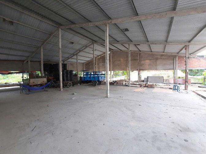 Thuê Kho Xưởng mặt tiền QL1A, dt ~2000m2 có bãi xe, Trạm điện 3 pha