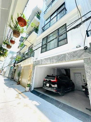 BÁN NHÀ NGUYỄN ĐÌNH HOÀN, 6 TẦNG THANG MAY, Ô TÔ TRÁNH, KINH DOANH 