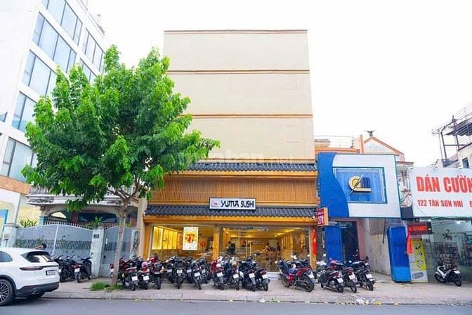 Bán nhà MT Tân Sơn Nhì 19 x 30m đúc 1 hầm lửng 5 lầu ST giá 160 tỷ 