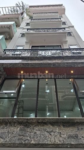 Bán Tòa nhà 7 Tầng Trần Quốc Hoàn 52m2  nhà mới ô tô vào nhà 