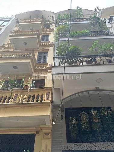 Bán nhà  4,5 Tầng KPL Hoàng Cầu - Mai Anh Tuấn.MB 70m MT 5m GARA 7 chỗ