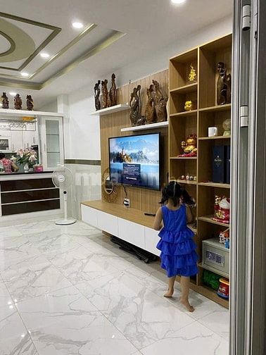 Nhà 5 tầng. 4,3x10m. xe hơi vào nhà - Phan Đăng Lưu-Phan Xích Long