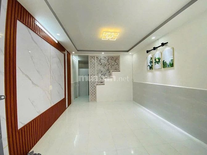 Nhà 1trệt 1lầu cần bán gấp ngay chợ Đầu Mối Hóc Môn _DT 64m2-Giá1tỷ520