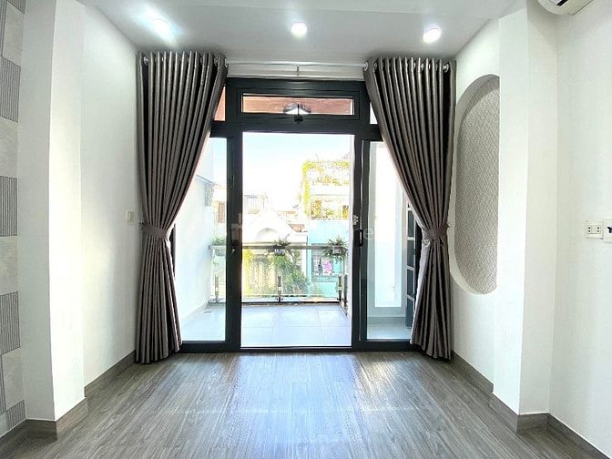 Nhà đường 5m Thông Bùi Quang Là F12 GV. 3.5x14 Trệt 2 lầu sân thượng
