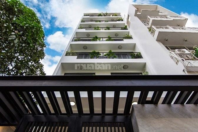 Tòa nhà 6 tầng 19 phòng. 5x26m. HDT 90tr/tháng. 2 mặt tiền hẻm xe hơi