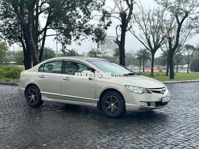 Gia đình cần bán Civic 2008 MT màu vàng nhạt
