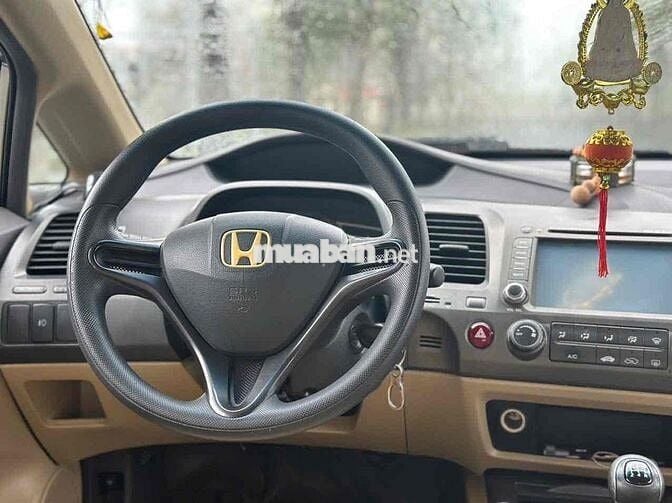 Gia đình cần bán Civic 2008 MT màu vàng nhạt