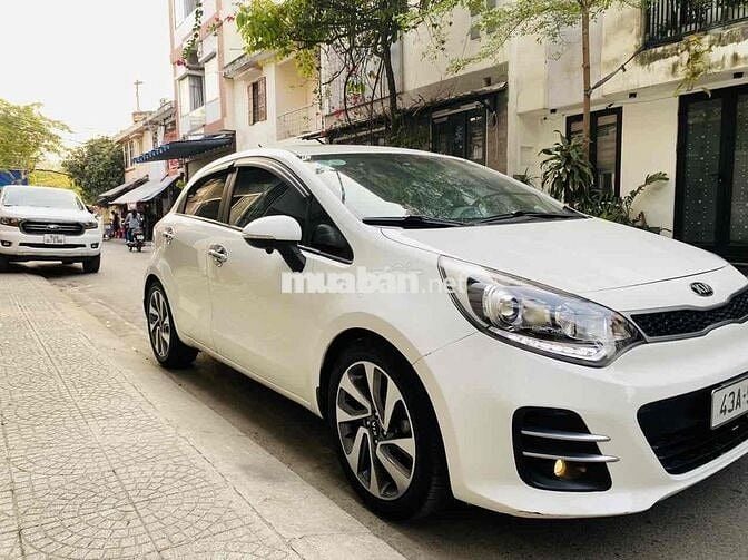 Kia Rio màu trắng 2015 1.4 AT Hatchback
