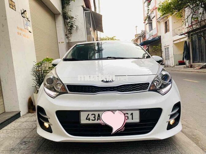 Kia Rio màu trắng 2015 1.4 AT Hatchback
