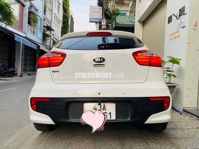 Kia Rio màu trắng 2015 1.4 AT Hatchback