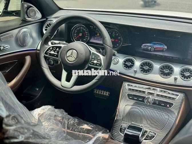 E200 SPORT - 76000 km - ĐEN WRAP TRẮNG