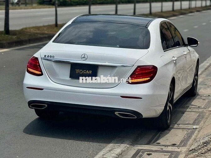 E200 SPORT - 76000 km - ĐEN WRAP TRẮNG