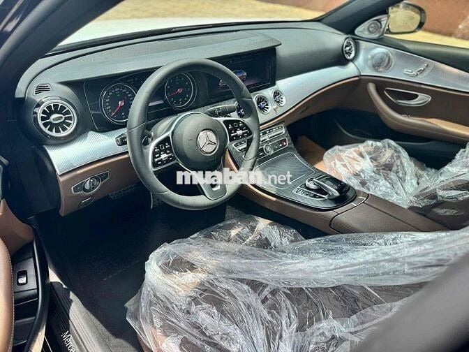 E200 SPORT - 76000 km - ĐEN WRAP TRẮNG