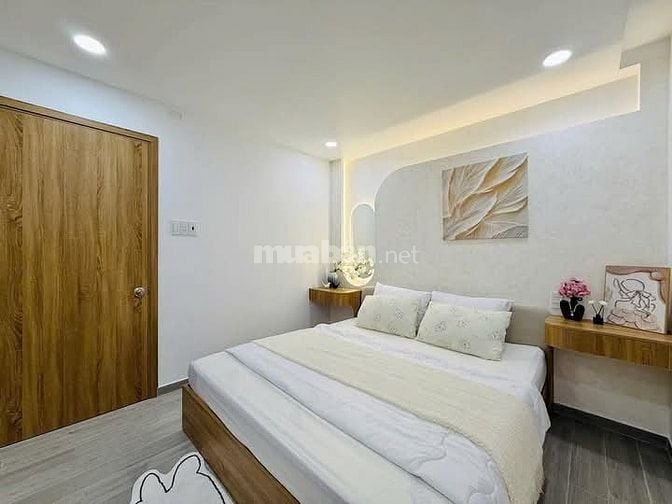 Nhà 7 x 5 nở hậu đúc 1 trệt 2 lầu sân thượng hẻm 4m đường số 28 p6 