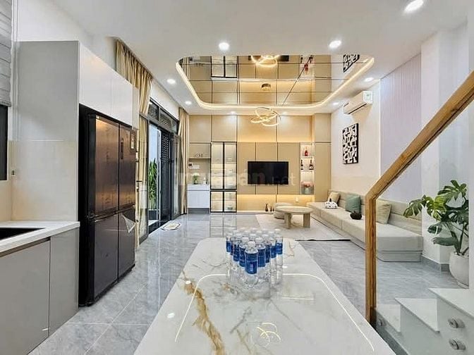 Nhà 7 x 5 nở hậu đúc 1 trệt 2 lầu sân thượng hẻm 4m đường số 28 p6 