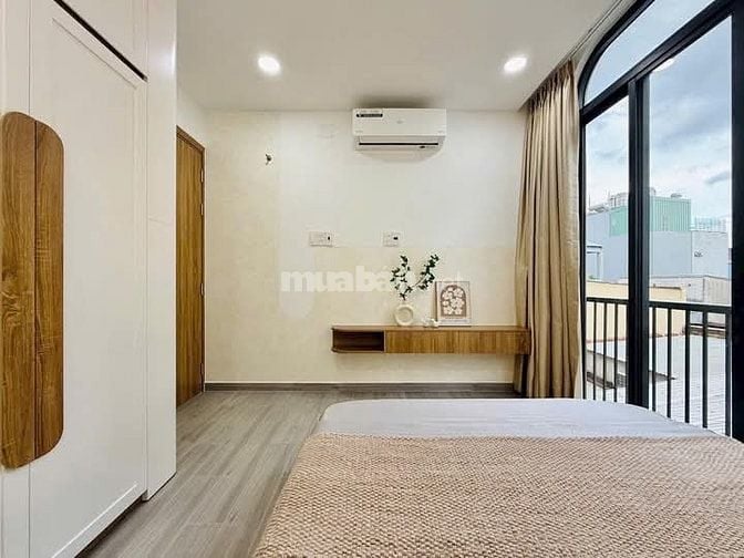 Nhà 7 x 5 nở hậu đúc 1 trệt 2 lầu sân thượng hẻm 4m đường số 28 p6 