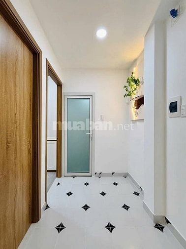 Nhà 7 x 5 nở hậu đúc 1 trệt 2 lầu sân thượng hẻm 4m đường số 28 p6 