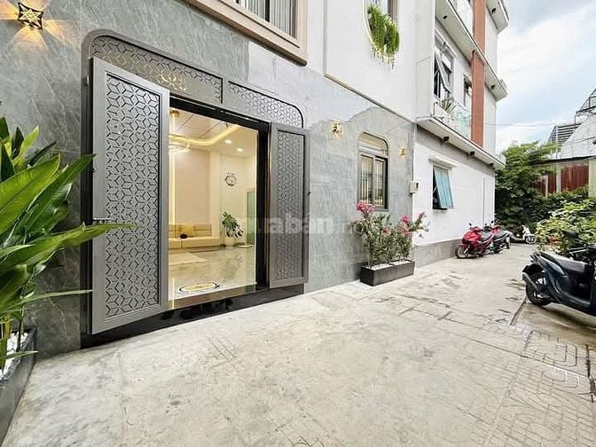 Nhà 7 x 5 nở hậu đúc 1 trệt 2 lầu sân thượng hẻm 4m đường số 28 p6 