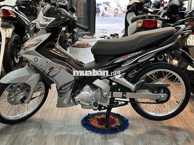 Ex tự động xuống áo 2010 căm đùm niền xám xi măng