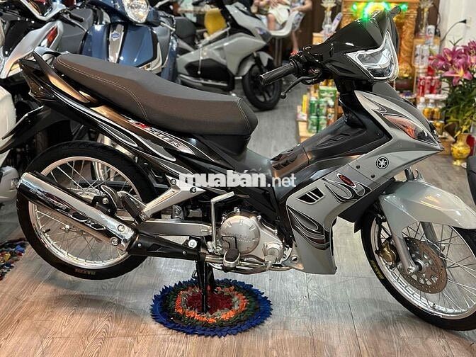 Ex tự động xuống áo 2010 căm đùm niền xám xi măng